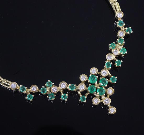 An 18ct gold, emerald and diamond necklace, approx. 39.5cm.